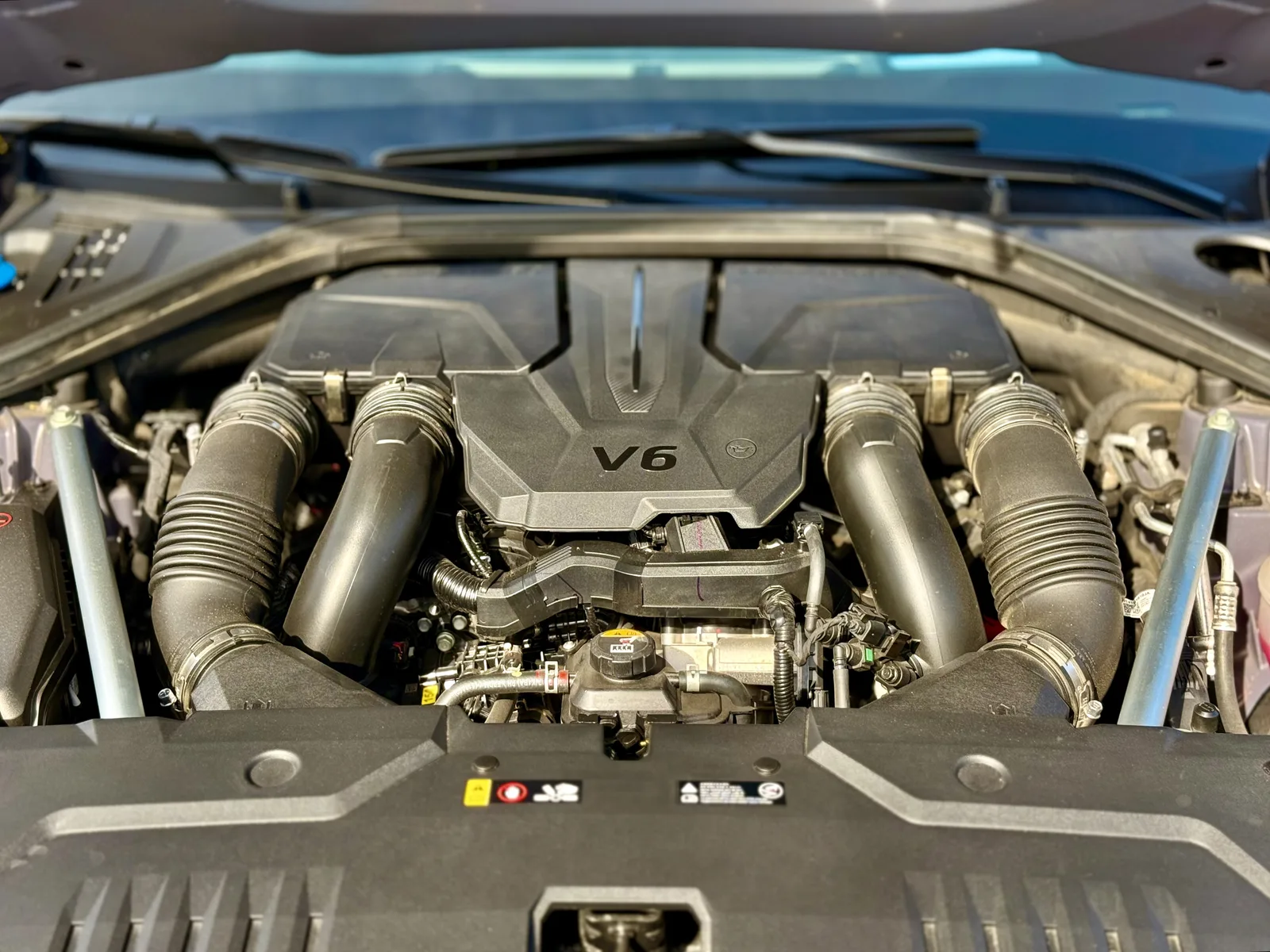 2026 Genesis GV70 vs 2025 Buick Envista Avenir: Is Twice the Price Worth It?