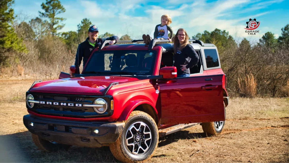 Cory, Holli and Tucker Fourniquet with their red Ford Bronco — GT: Garage Talk
