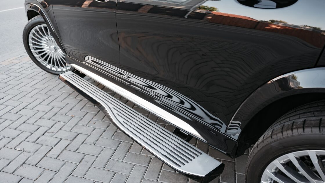 Modern luxury car exterior door handle close up photo