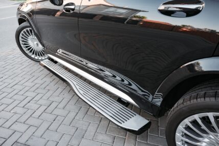 Modern luxury car exterior door handle close up photo