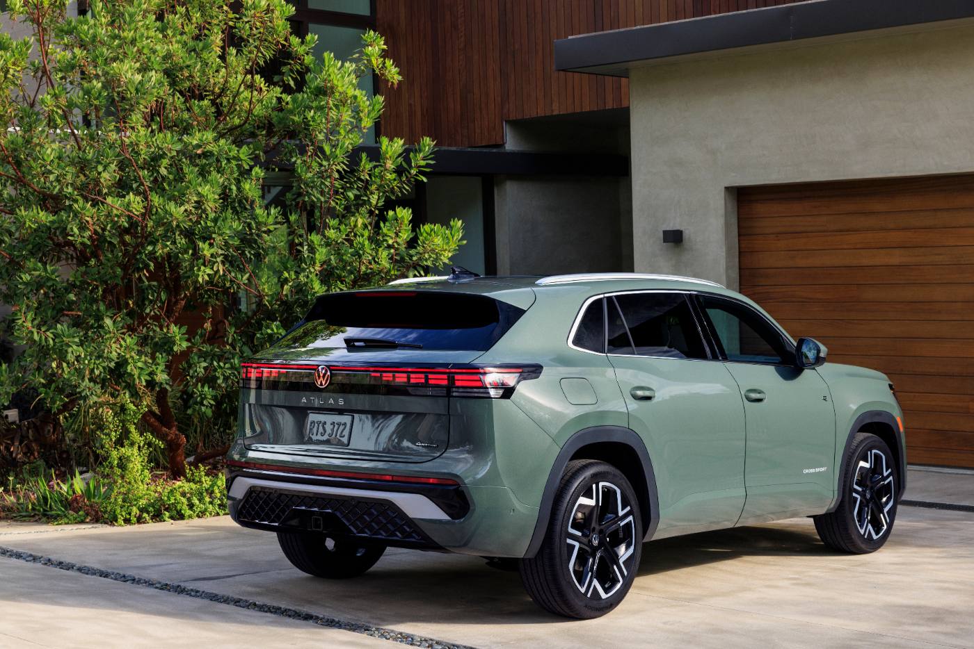 2027 VW Atlas Cross Sport rear three-quarter showing coupe-like roofline