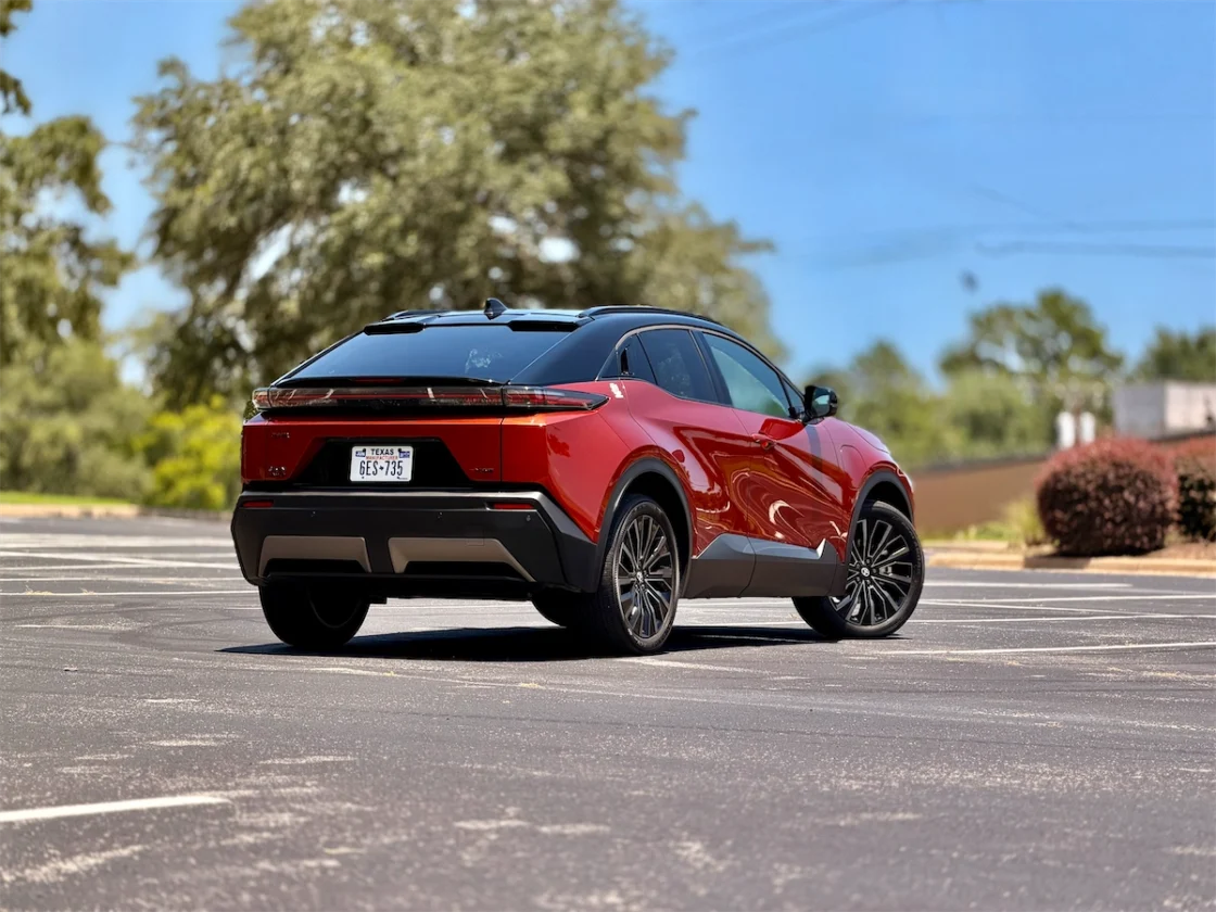 Rear three-quarter view of the two-tone electric SUV