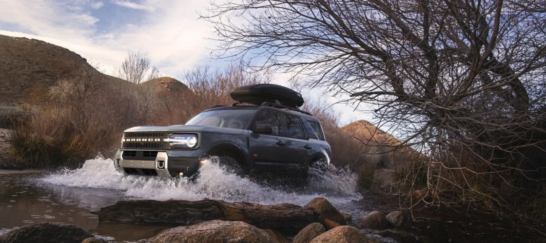 A Ford Bronco Sport fording a stream, one of the models filling the gap left by the discontinued Ford Escape