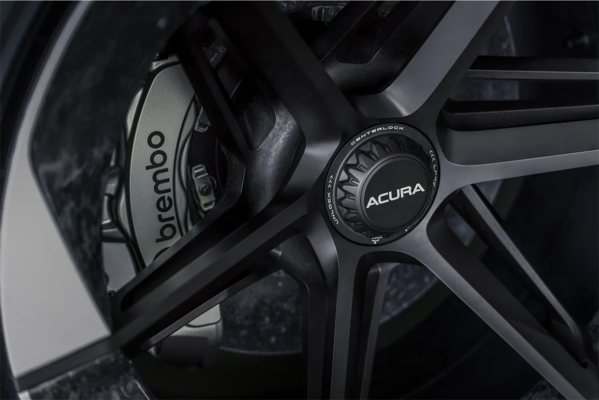 Carbon-ceramic Brembo brakes behind the 22-inch centerlock wheels of the Acura NEXERA Vision concept