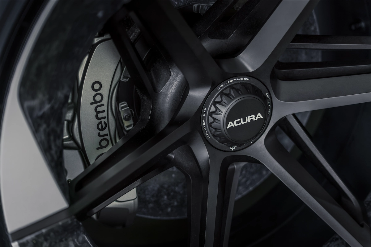Carbon-ceramic Brembo brakes behind the 22-inch centerlock wheels of the Acura NEXERA Vision concept