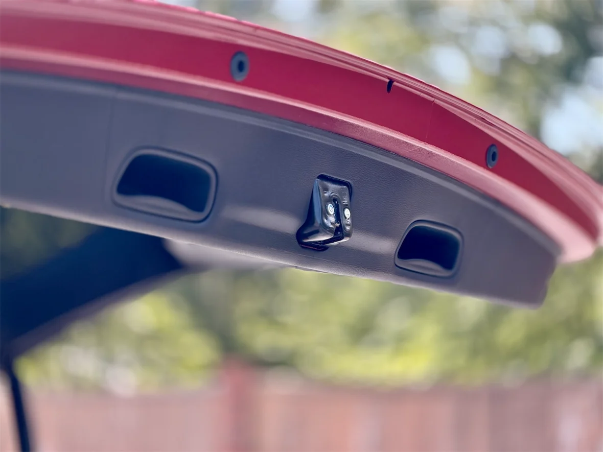 Power liftgate controls on the underside of a 2027 Chrysler Pacifica hatch