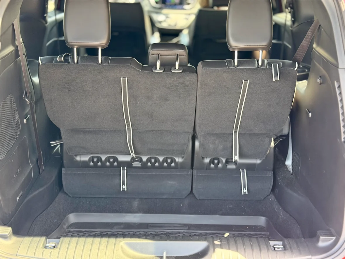 Third-row seats folding into a flat load floor in a 2027 Chrysler Pacifica