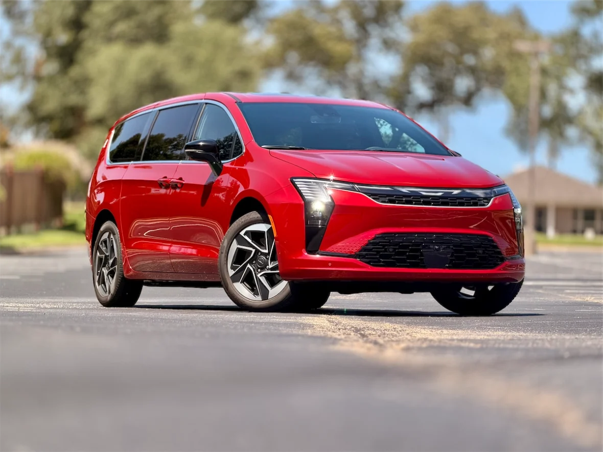 Front three-quarter view of a red 2027 Chrysler Pacifica Limited AWD
