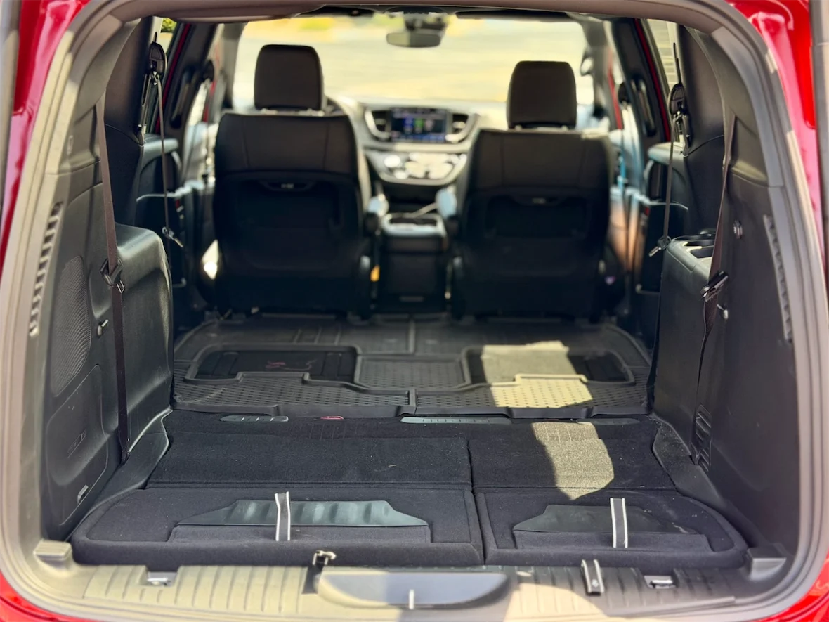 Interior of a 2027 Chrysler Pacifica viewed from the open liftgate