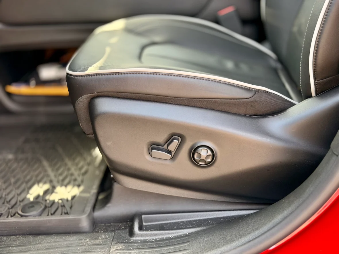 Power seat controls and all-weather floor mat in a 2027 Chrysler Pacifica