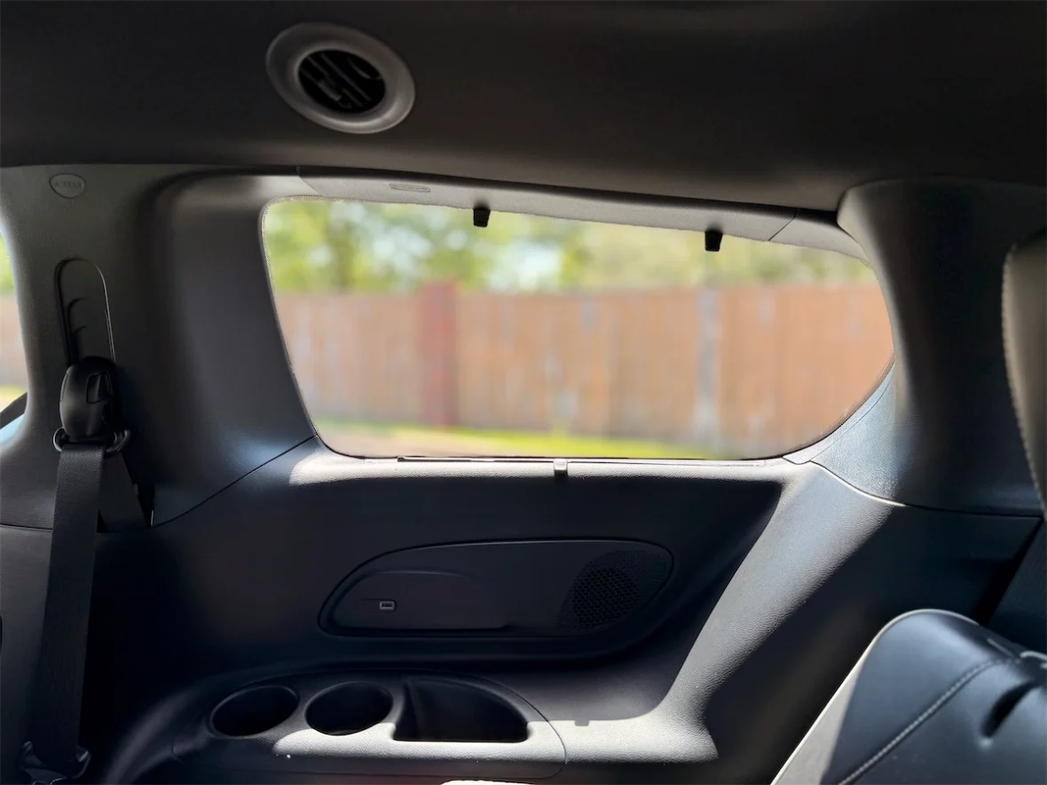 Third-row side panel with window, cupholders and storage in a 2027 Chrysler Pacifica