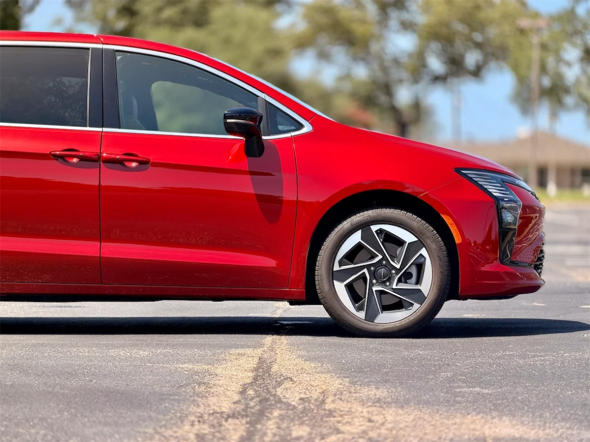 Side profile of a red 2027 Chrysler Pacifica Limited AWD