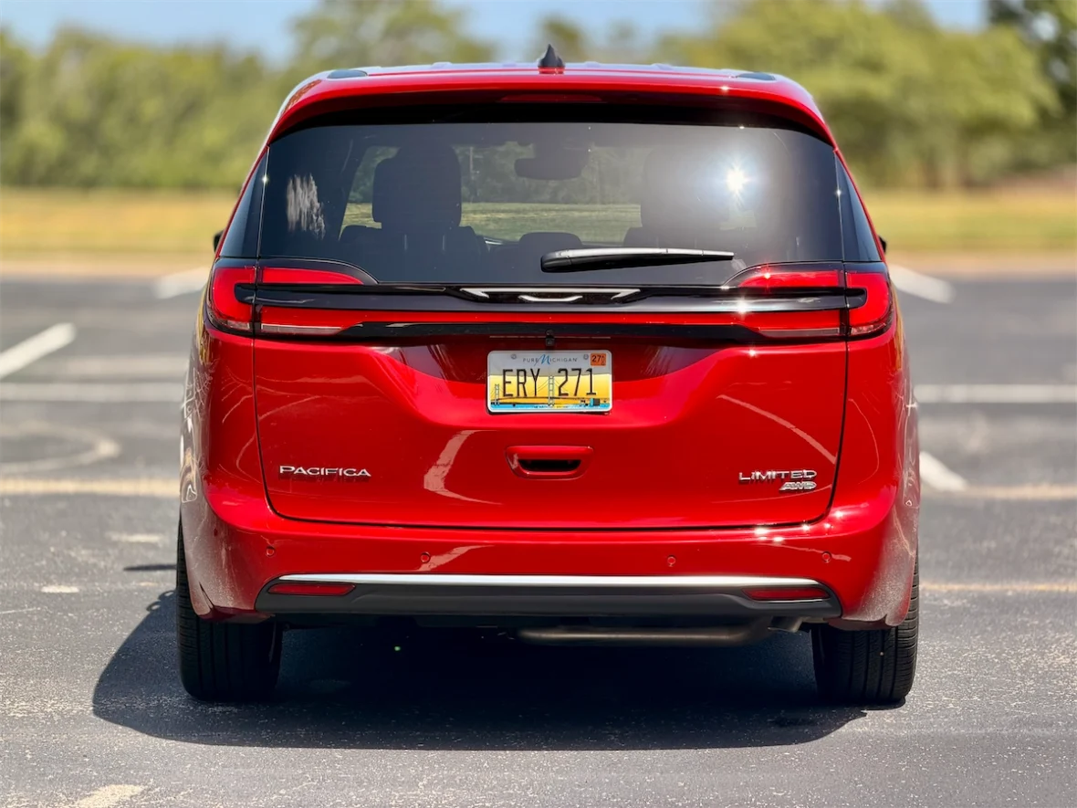 Rear straight-on view of a red 2027 Chrysler Pacifica