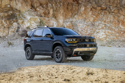 Refreshed 2027 Honda Passport TrailSport parked in a rocky quarry