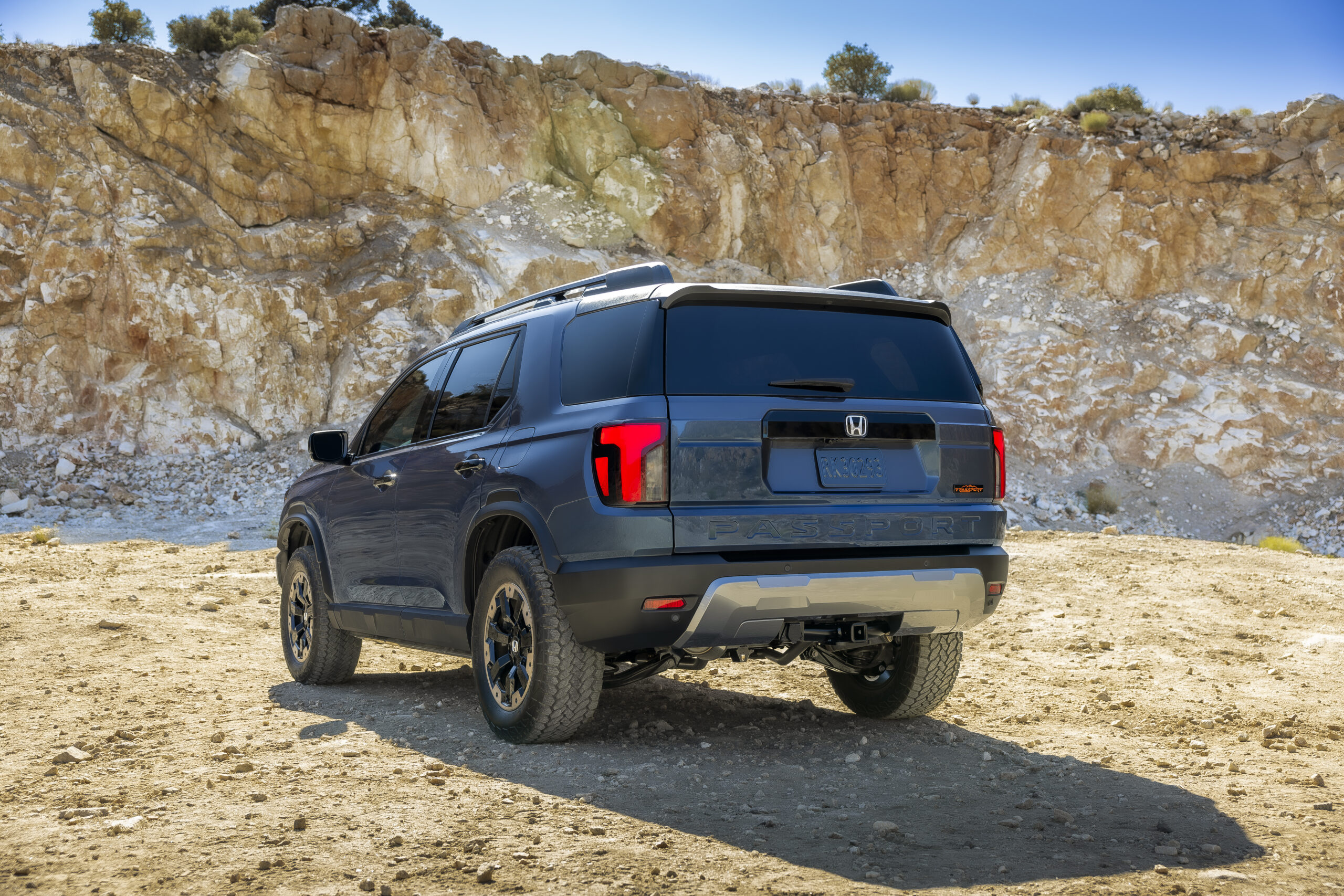 Rear view of the refreshed TrailSport parked in a quarry