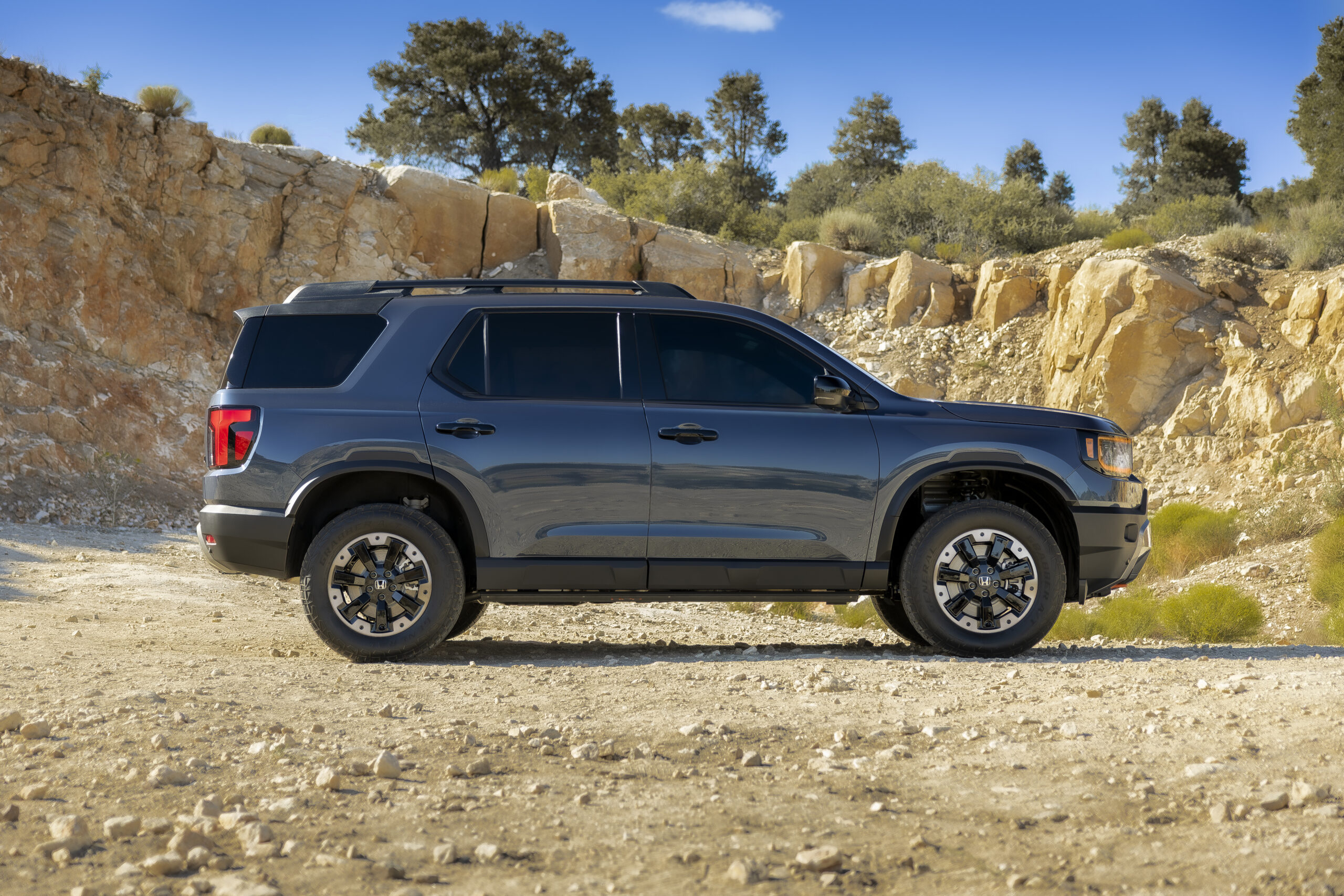 2027 Honda Passport pricing starts at $46,790, with the TrailSport shown here in profile
