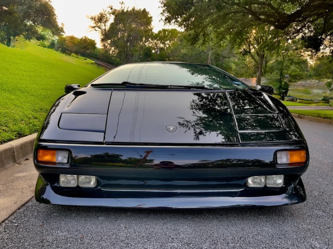Low-slung 1991 Lamborghini Diablo in a neighborhood