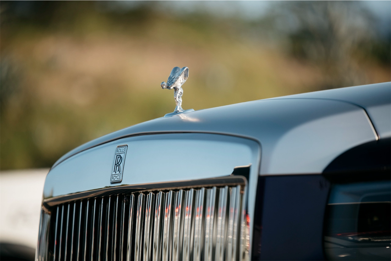 Rolls-Royce Cullinan grille and Spirit of Ecstasy, with the hand-built V12 behind