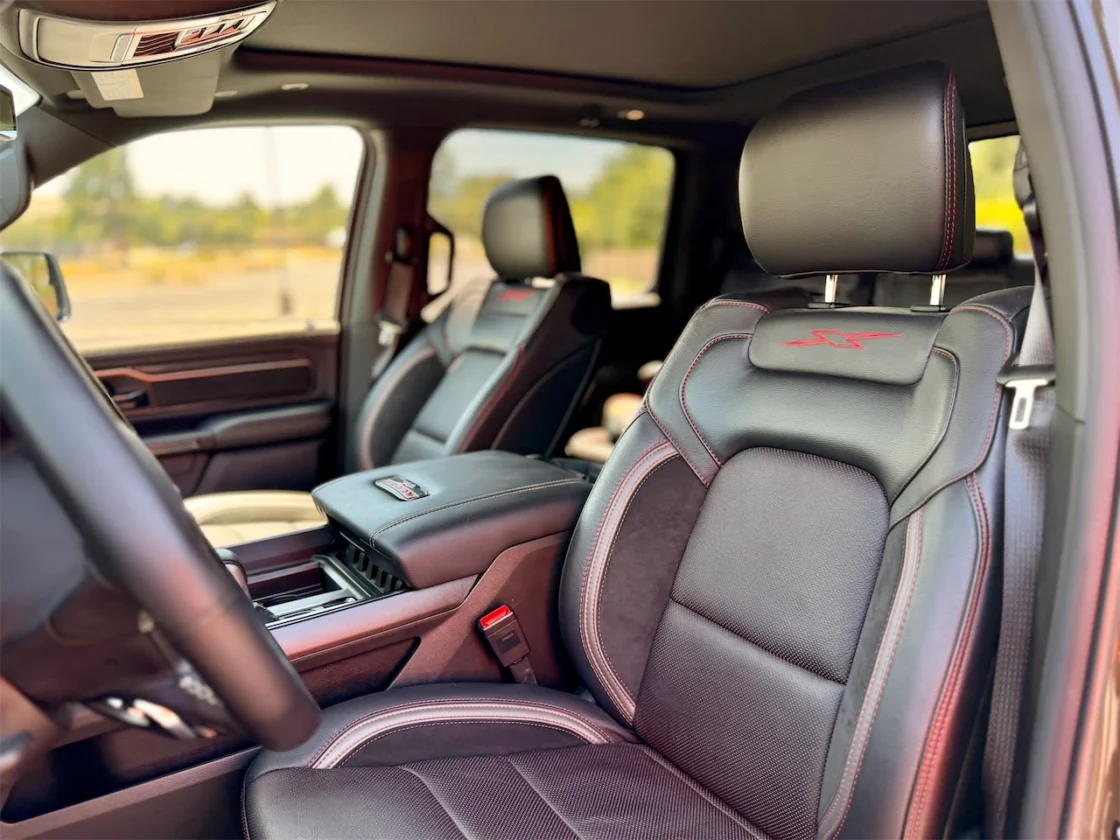 Black front bucket seats with red accents