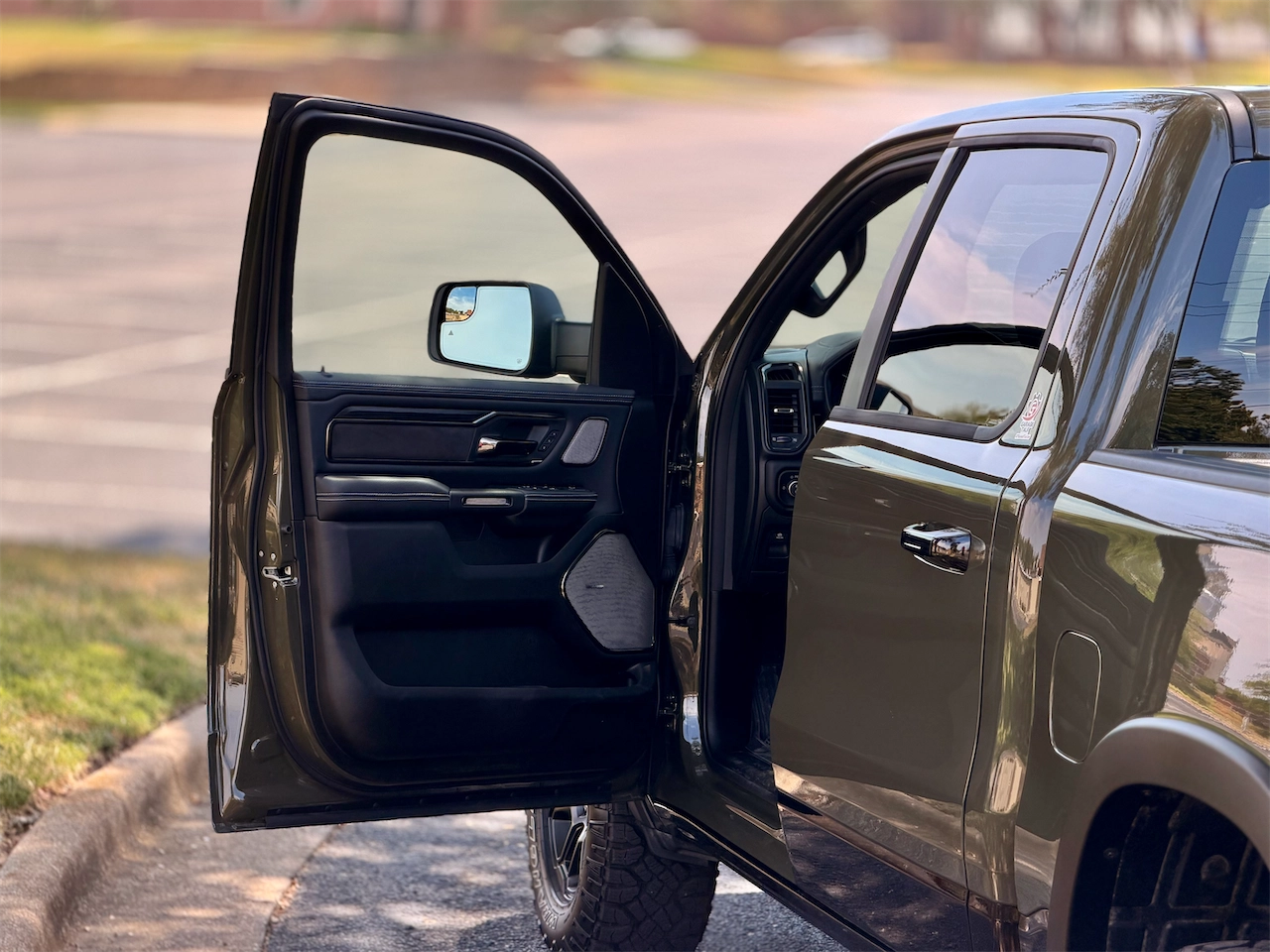 Open driver door on the lifted off-road truck