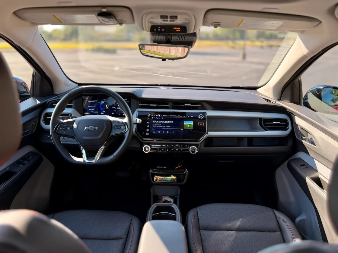Dashboard with three screens and a wide, flat touchscreen