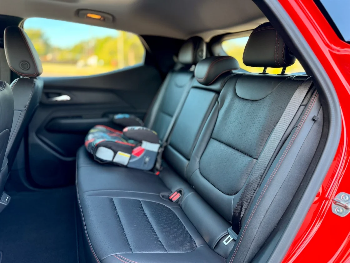 Child car seat installed in the back seat