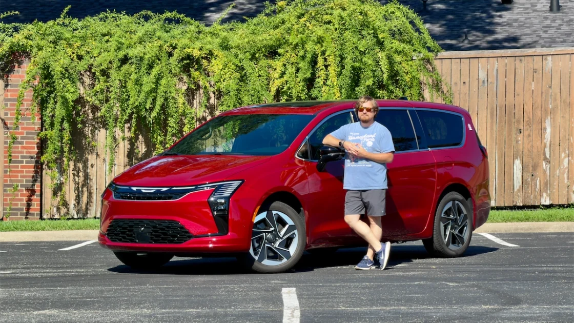2027 Chrysler Pacifica Limited AWD in Red Hot Pearl-Coat parked in a driveway