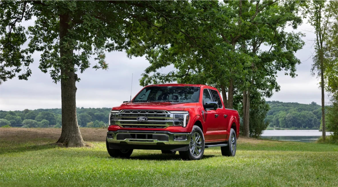 2027 Ford F-150 Lariat parked beside a lake