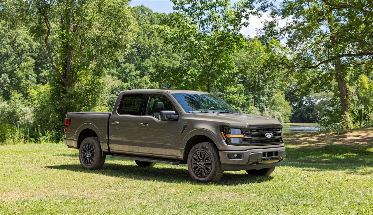 2027 Ford F-150 XLT parked among trees
