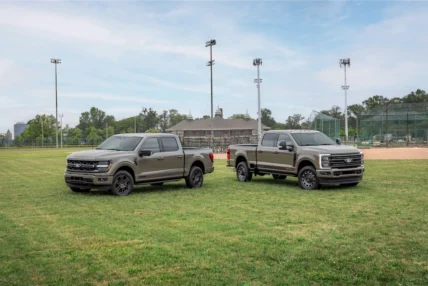 F-150 Carhartt parked beside the Super Duty Carhartt
