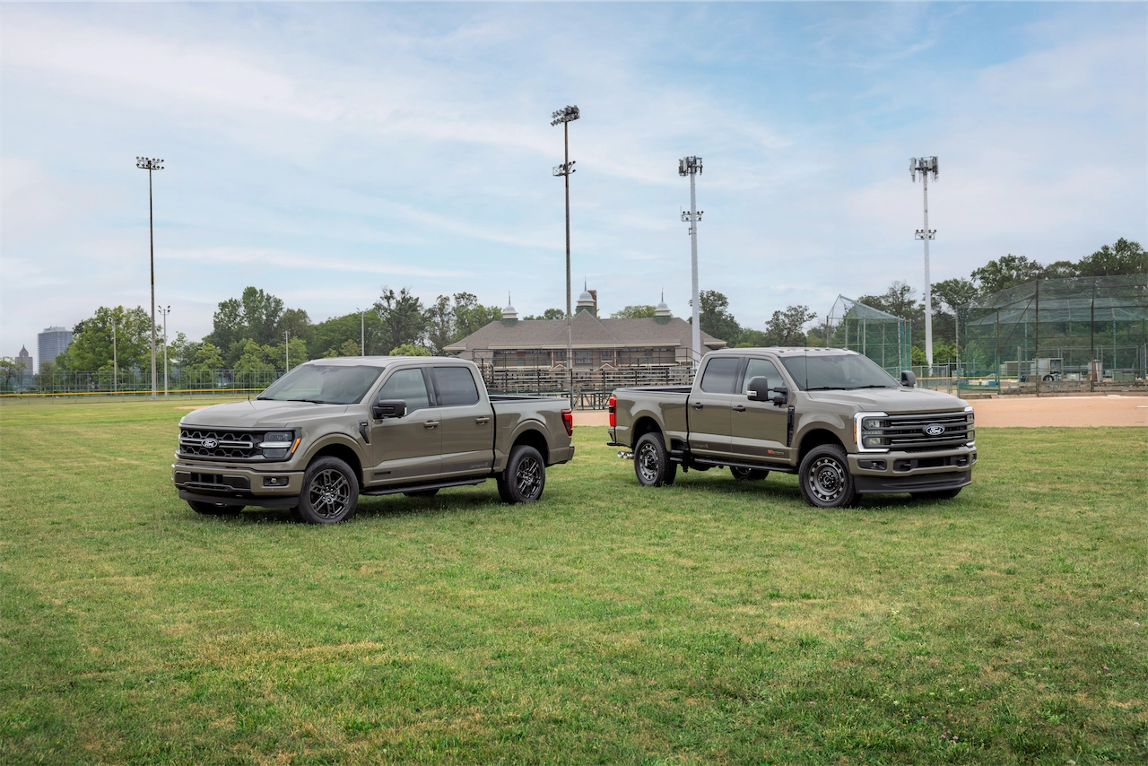 F-150 Carhartt parked beside the Super Duty Carhartt