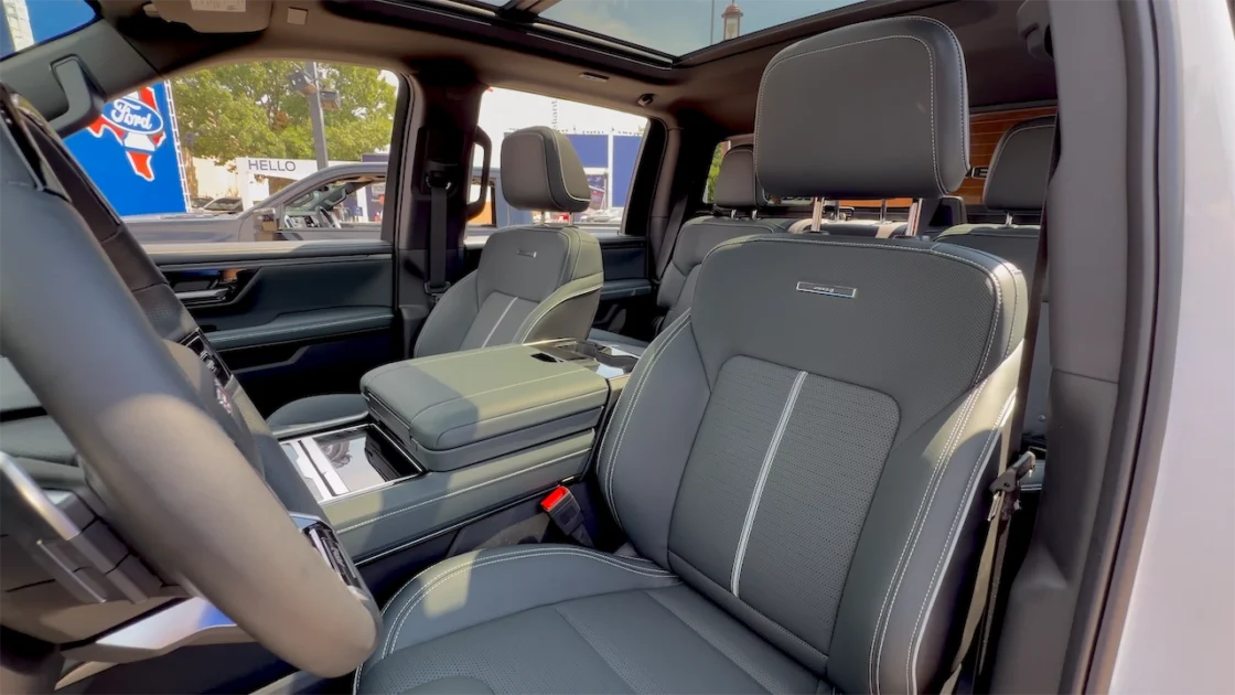 Green front seats with light piping in the 2027 GMC Sierra AT4