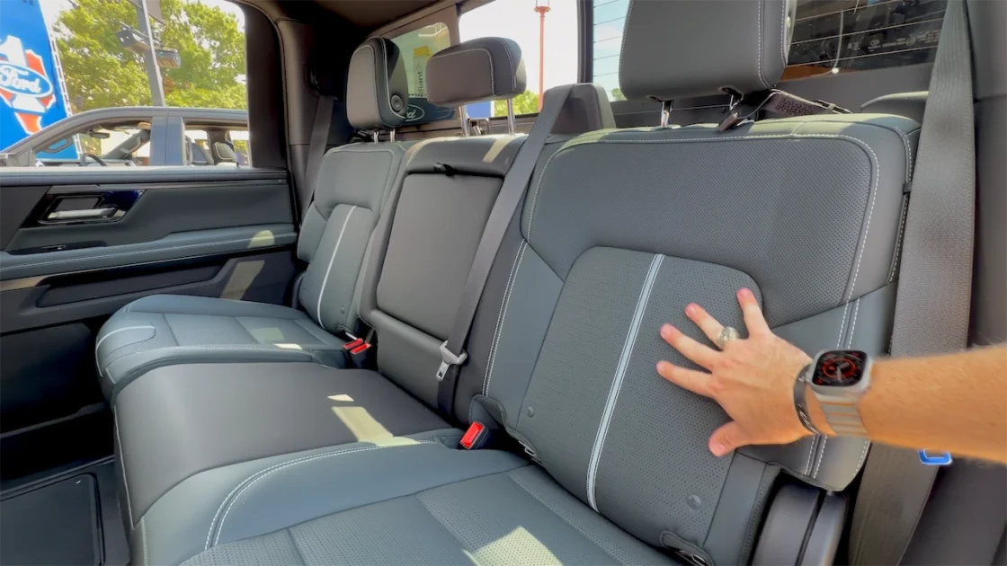 Green rear bench seat with textured inserts in the 2027 GMC Sierra AT4