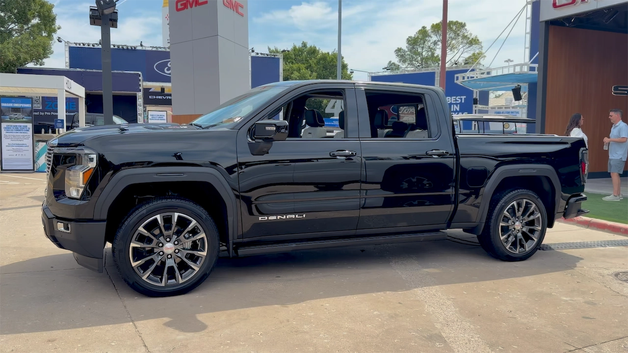 Side profile of the black Sierra Denali crew cab