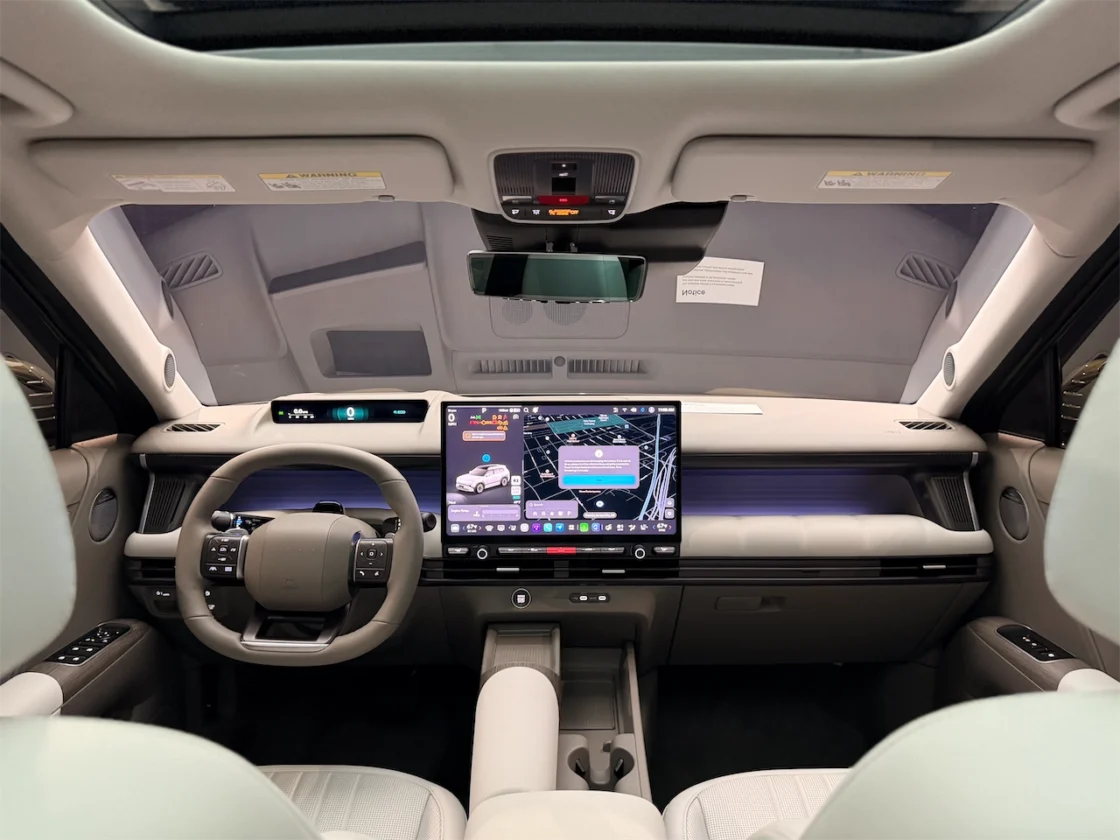 2027 Hyundai Tucson dashboard with Pleos Connect touchscreen and Double D-Cut steering wheel