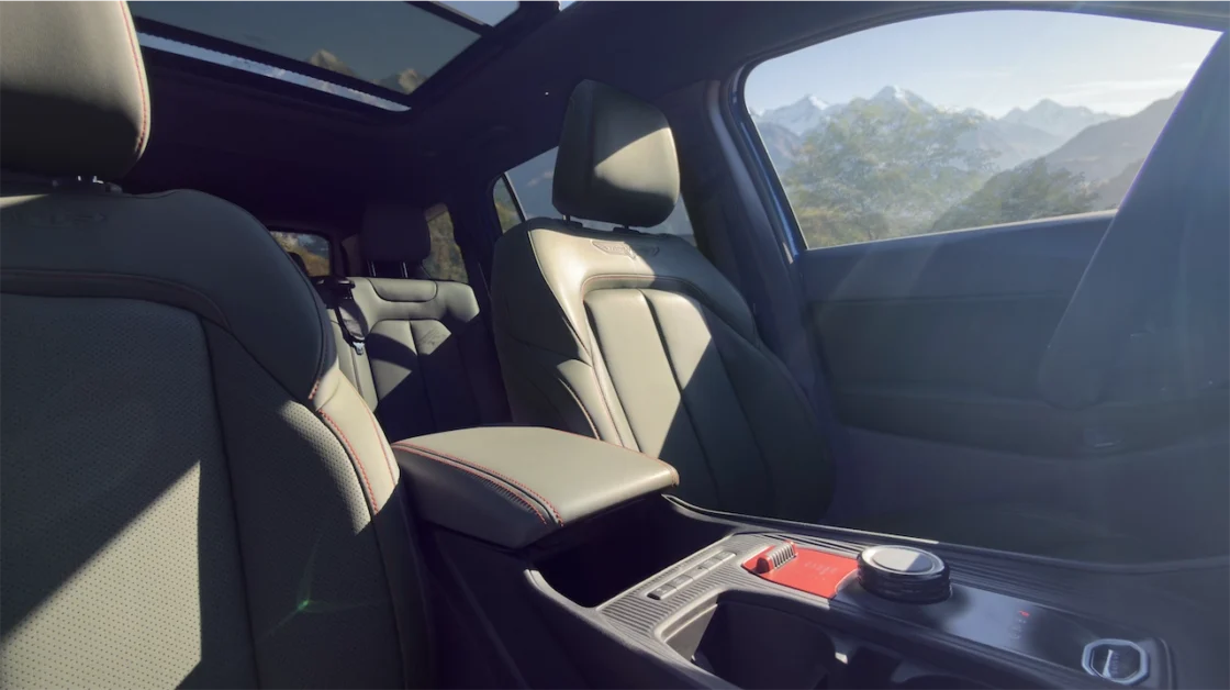 Mantis Green front seats with red stitching in the Cherokee Trailhawk