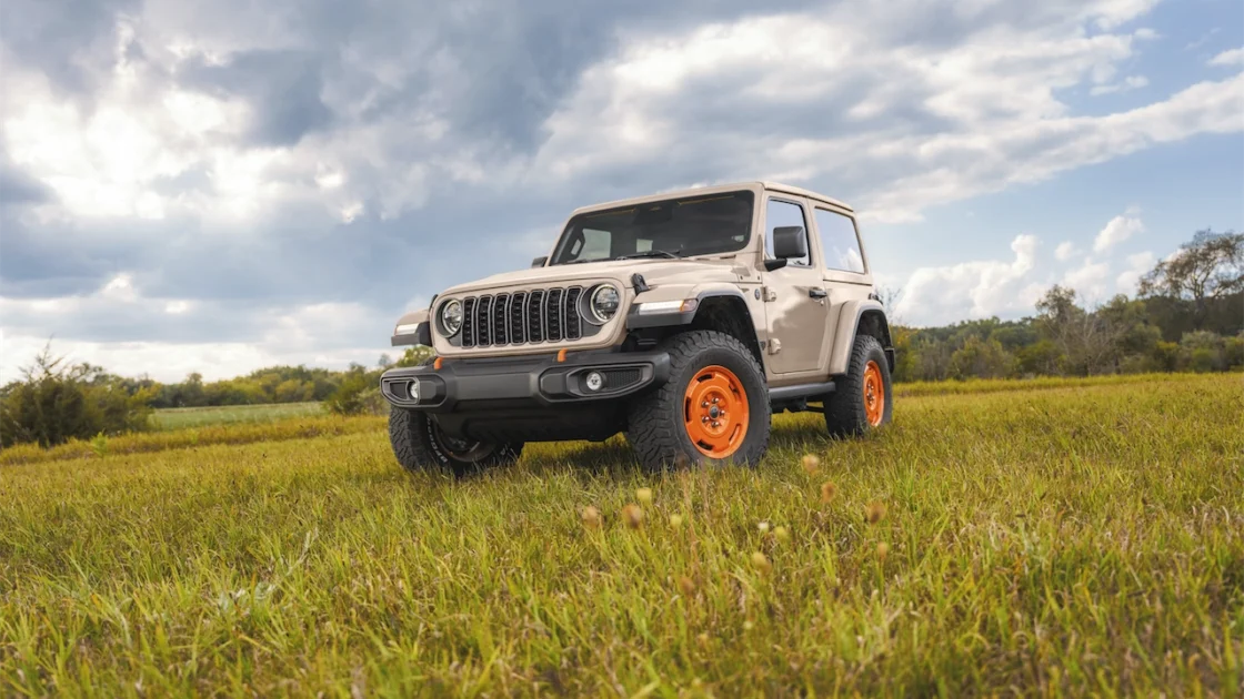 2027 Jeep Wrangler JL-2A two-door in Gobi parked in a field