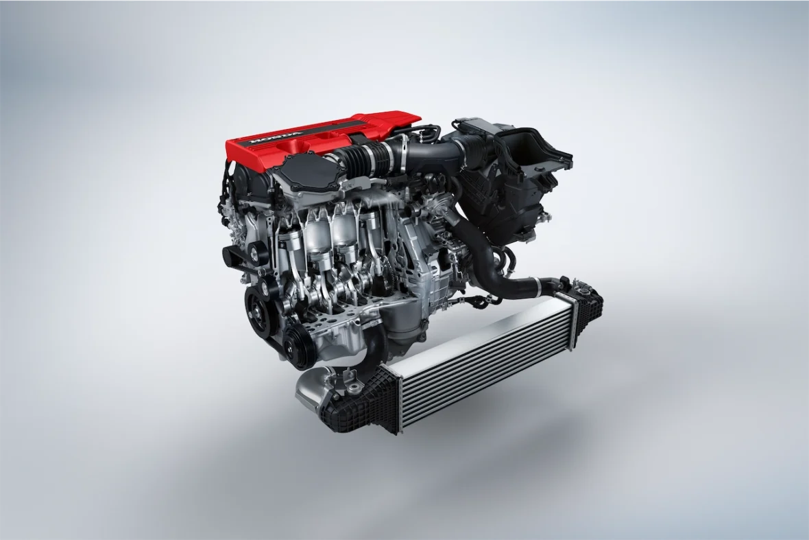 Turbocharged K20C engine under the hood of the Civic Type R with its red engine cover