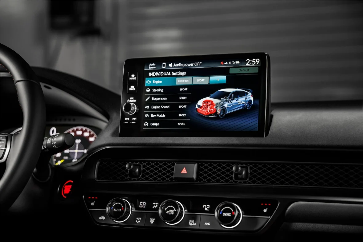 Civic Type R center touchscreen showing drive mode settings above the climate controls