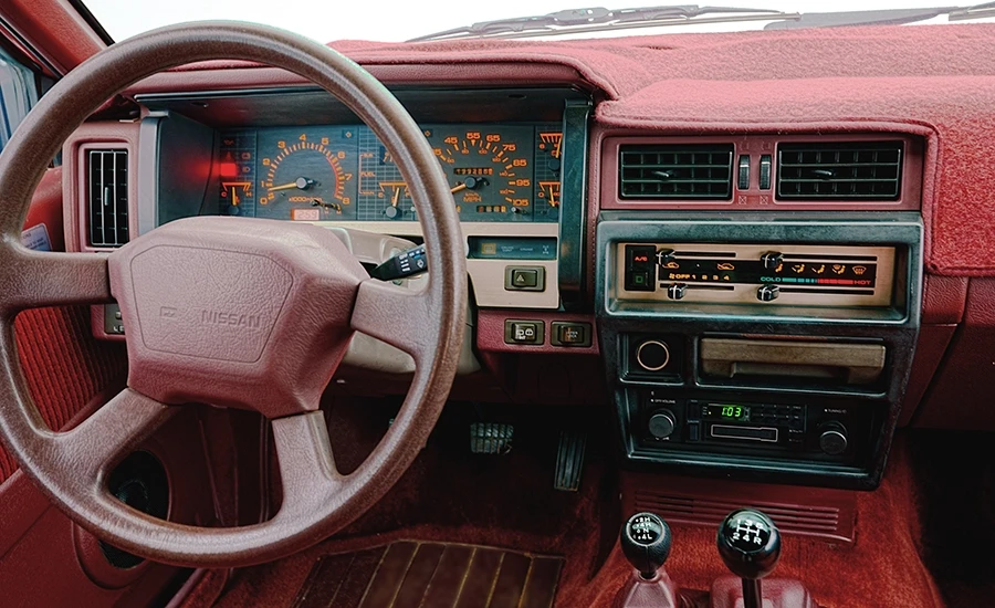Burgundy interior of the 1987 Nissan Pathfinder