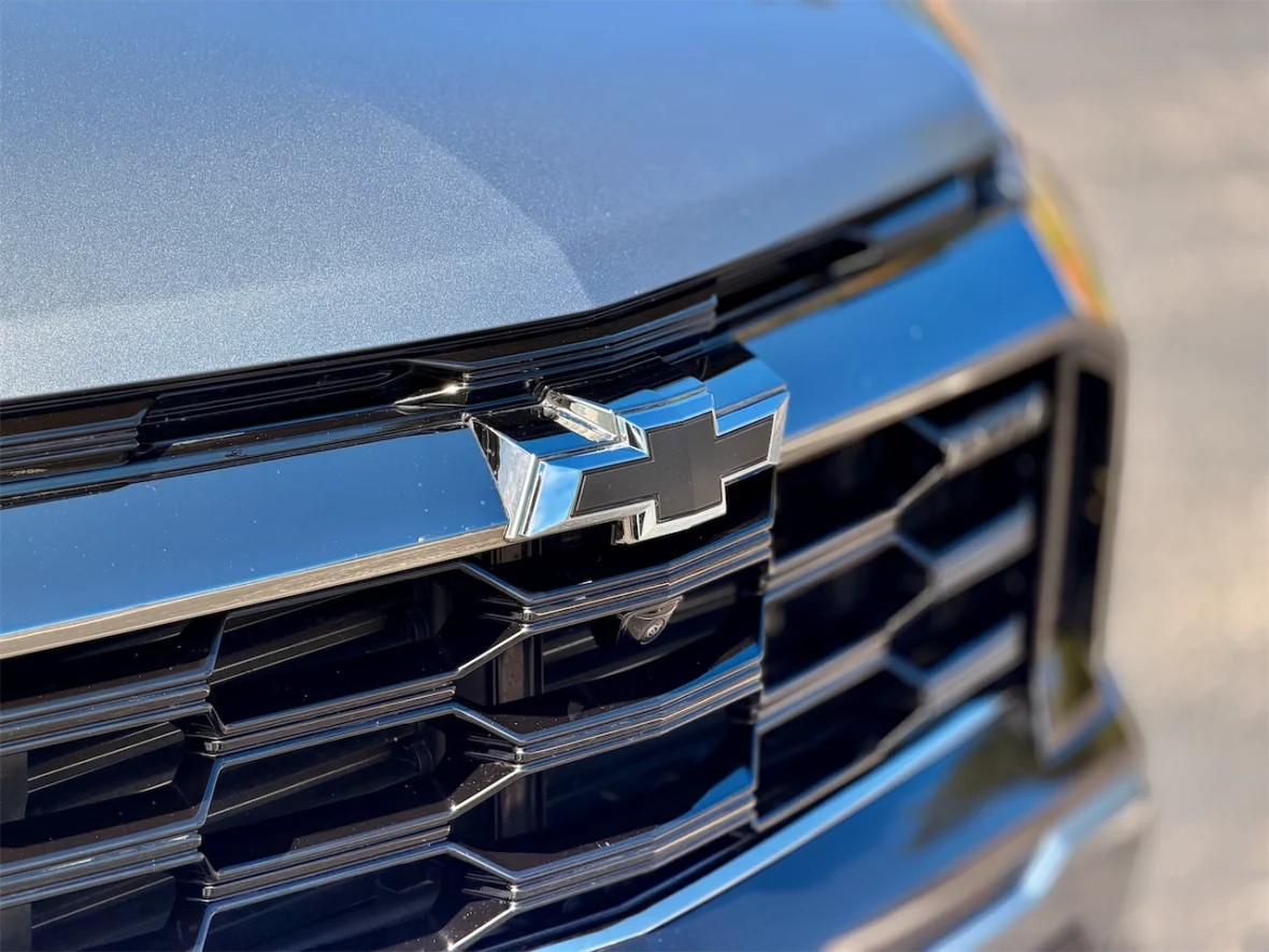 Close-up of a Chevrolet vehicle's front grille with the iconic bowtie logo prominently displayed.