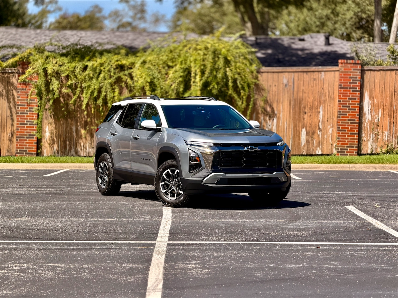 2026 Chevrolet Equinox ACTIV front three-quarter with white roof
