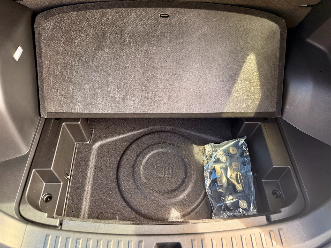 Under-floor storage and temporary spare in the 2026 Equinox ACTIV cargo area