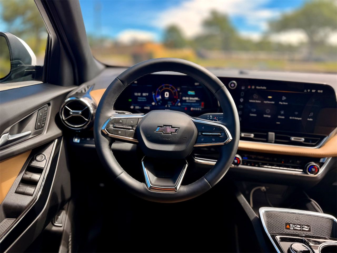 Dashboard with twin screens and physical seat buttons