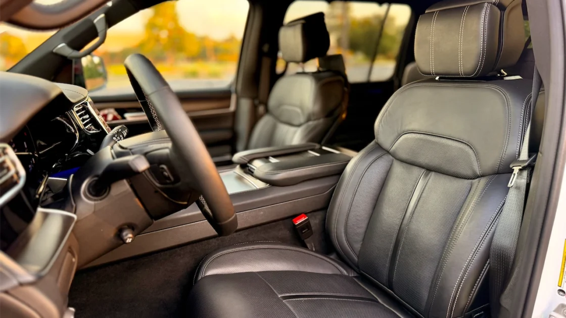 Black leather front seats in a luxury SUV
