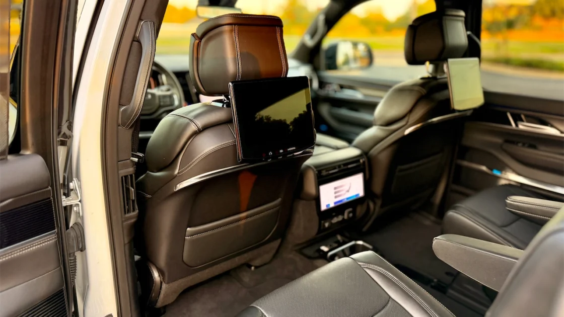 Second-row captain's chairs and rear entertainment screens in the 2026 Jeep Grand Wagoneer L