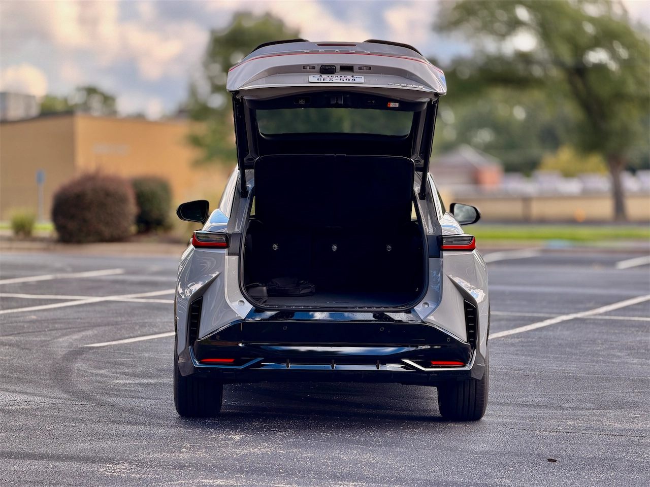 Open liftgate and cargo area with underfloor storage
