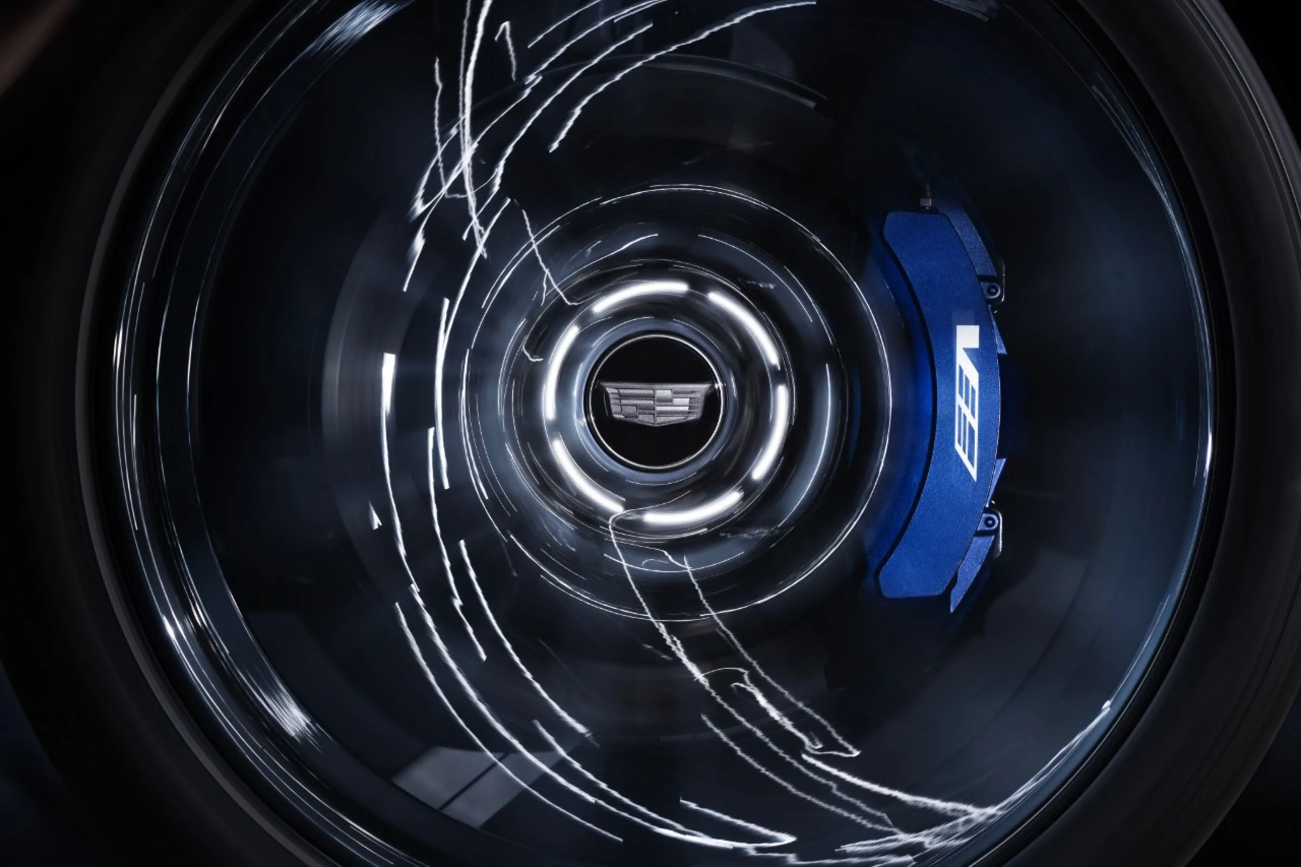 24-inch forged wheel with blue brake caliper