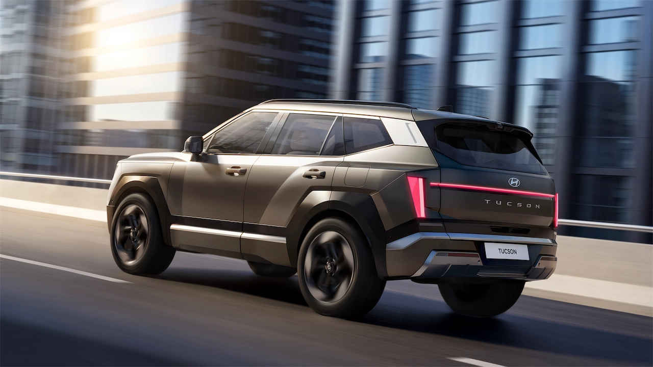 2027 Hyundai Tucson driving through the city