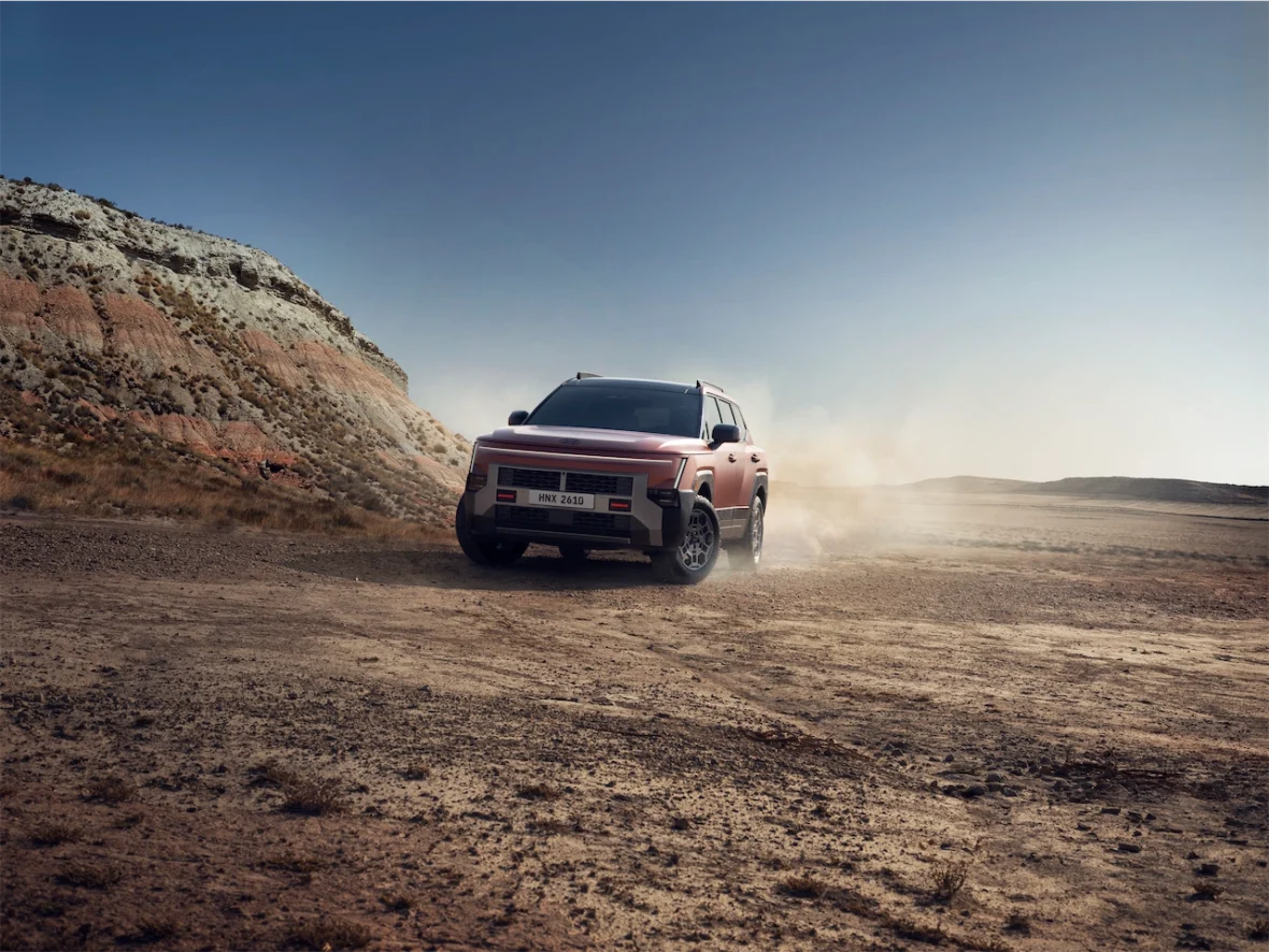 2027 Hyundai Tucson XRT PRO kicking up dust on a desert trail